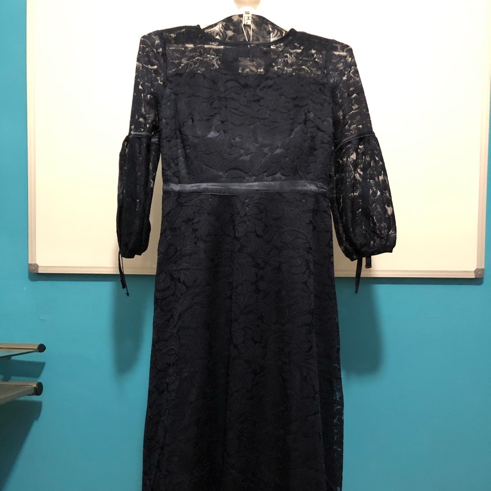 Navy blue size small dress. Runs small.